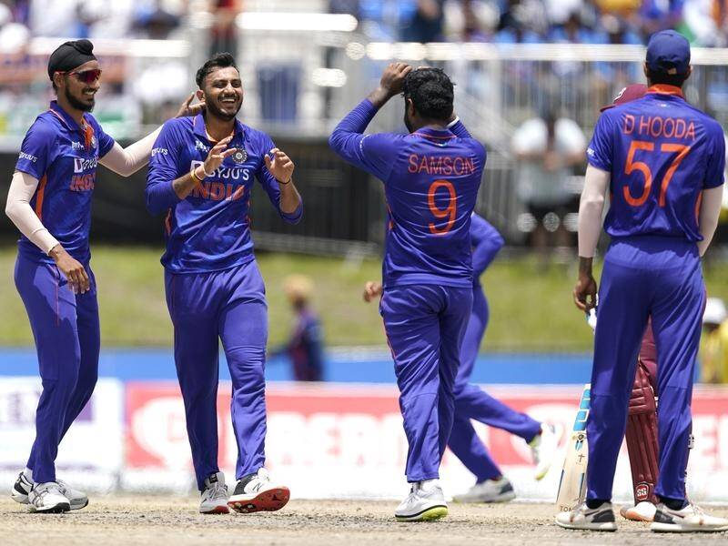 India's Axar Patel (2nd left) celebrates after Nicolas Pooran was run out during India's victory. (AP PHOTO)
