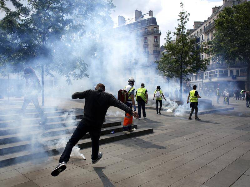 Yellow vest protesters clashed with riot police officers on the Place de la Republique, in Paris.