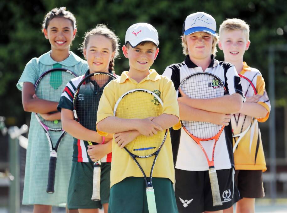 Cameron Goss, 11, Chelsea McGrath, 10, Rory Parnell, 9, Max Byrne, 11, and Reece Filliponi, 11, are off to play for their schools in representative tennis tournaments this week. Picture: JOHN RUSSELL