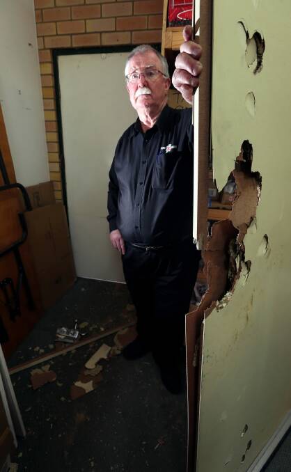 NewsXpress Rutherglen owner Jim O’Toole was shocked to find the back door to his business destroyed by a sledge hammer yesterday morning. Picture: JOHN RUSSELL
