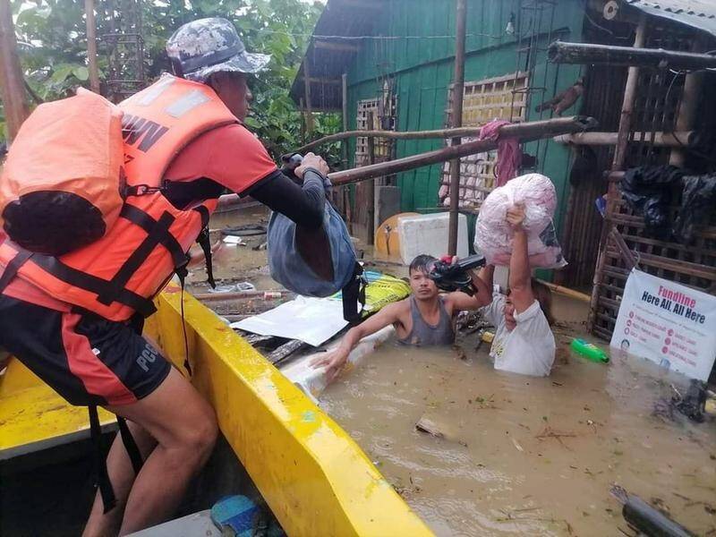 Rescuers continue to search for survivors after landslides and flooding hit the eastern Philippines.