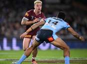 Queensland will look to playmaker Cameron Munster (l) to help lock up the State of Origin series.