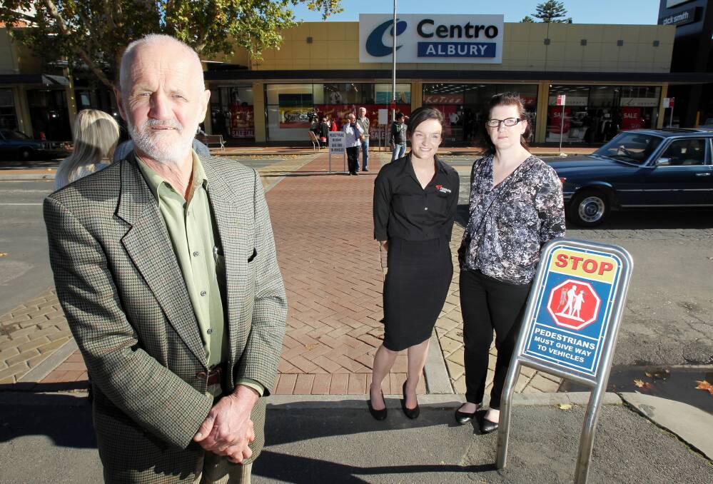 Cr David Thurley and Centro’s marketing manager Nicole Washington, centre manager Cherie Daly, are pleased that work on upgrading Kiewa Street will start on Tuesday. Picture: KYLIE ESLER