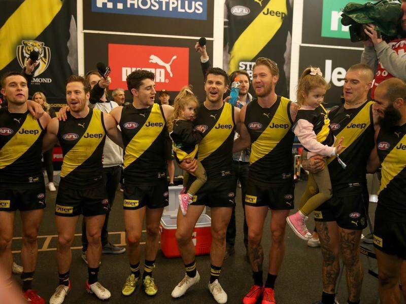 Richmond celebrate a third consecutive AFL win, this one over GWS.