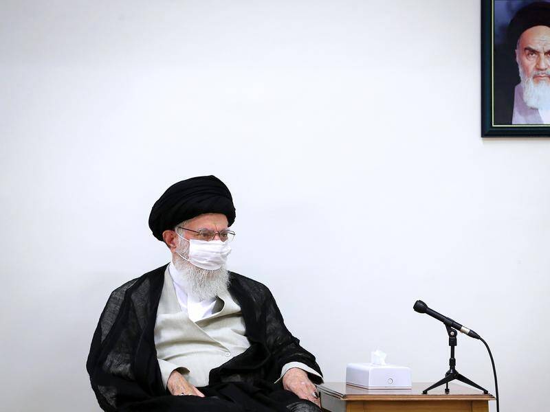 Iran's Supreme Leader Ayatollah Ali Khamenei has set an example by wearing a protective face mask.