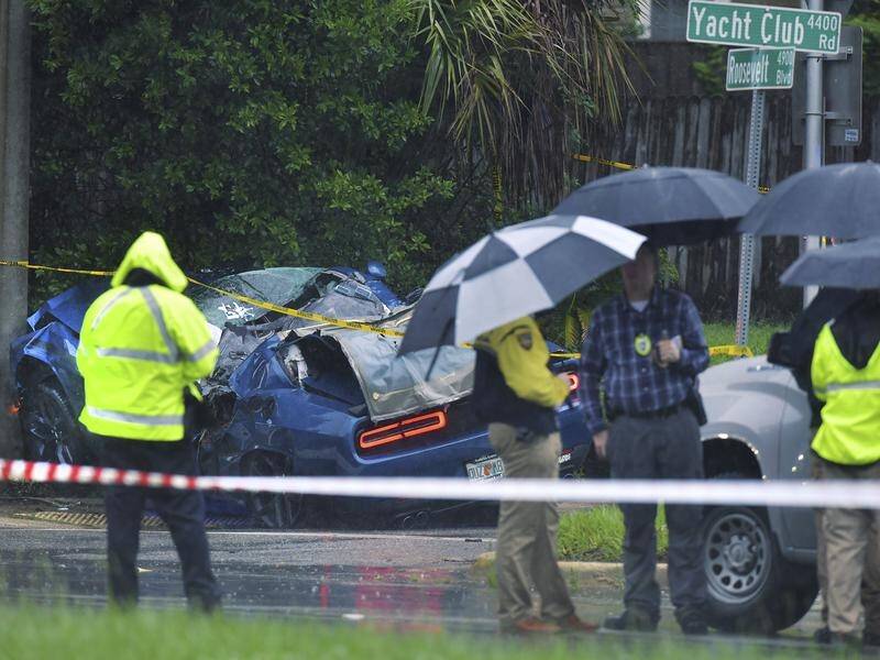 A tree fell in heavy rain and struck two cars in Jacksonville, Florida, killing one person.