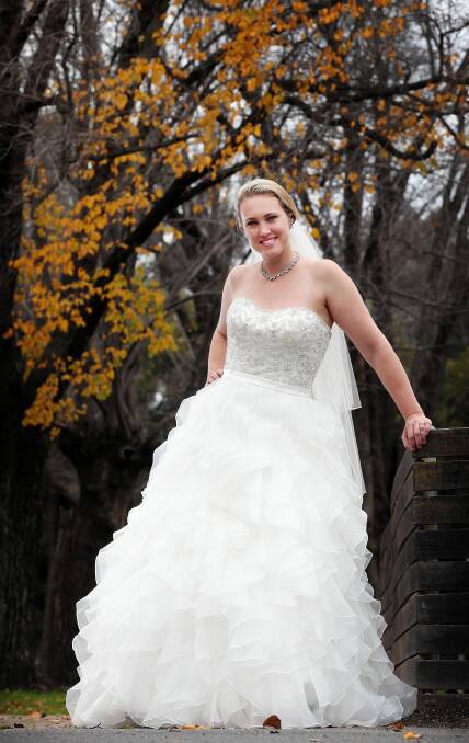 Kelly Boers parades a ruffled wedding dress in anticipation of The Border Mail Bridal Fair. Picture: JOHN RUSSELL