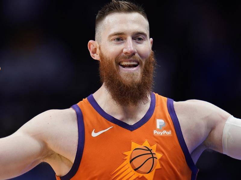 Aussie Aron Baynes is hoping to play at the Tokyo Olympics after his first NBA season with Toronto.