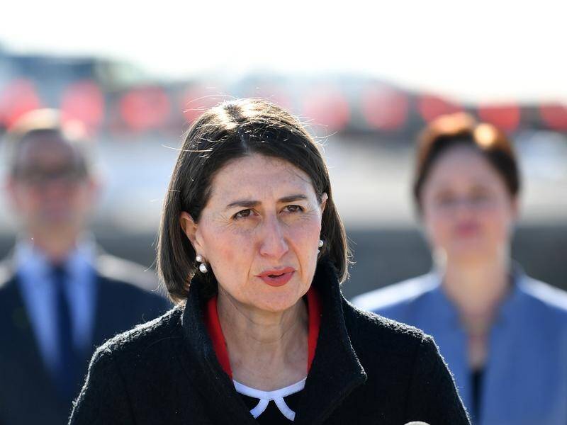 Gladys Berejiklian says other states should take on the returning flights diverted from Melbourne