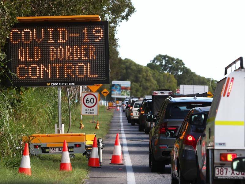 Hundreds of people are still trying to get into Queensland after the border with NSW was shut.