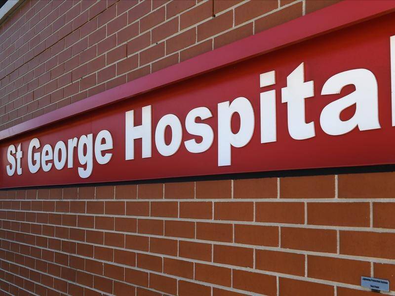 A 21-year-old man in Sydney's St George Hospital with head injuries has been charged with murder.