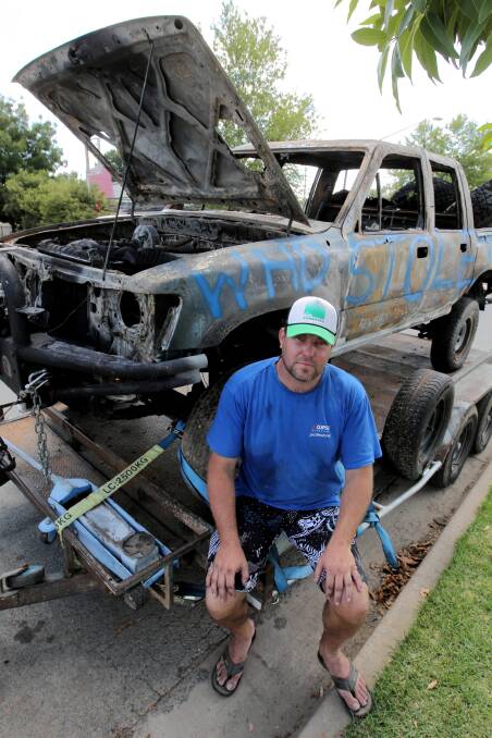 Craig Dougherty wants to know who is responsible for the theft and torching of his ute from outside his home at Jindera. Picture: DAVID THORPE