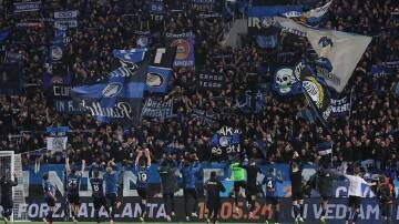 Atalanta and their fans celebrate reaching the final of the Coppa Italia. (EPA PHOTO)