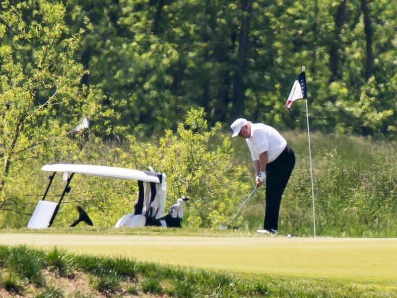 Donald Trump has played golf on the US Memorial Day weekend.