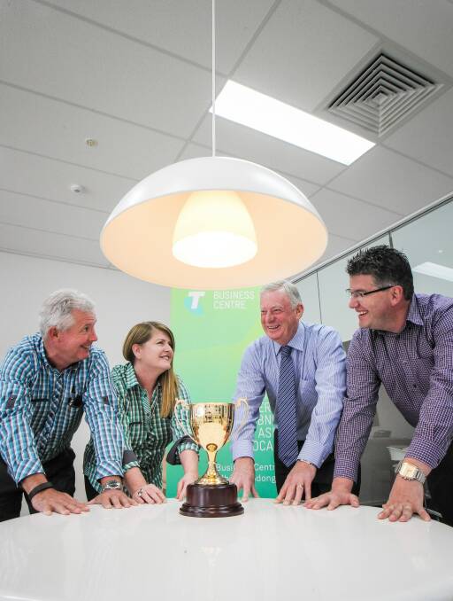 Bob and Barbara Toal with Wodonga Racing Club president Colin Haynes and Tom O’Connor with the Wodonga Gold Cup. Picture: DYLAN ROBINSON