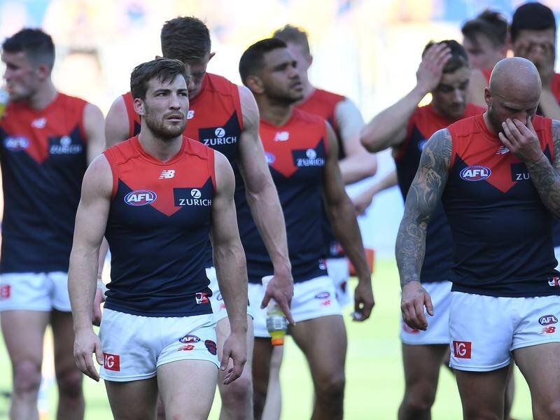 Coach Simon Goodwin is at a loss to explain why Melbourne couldn't handle the return trip to Perth.