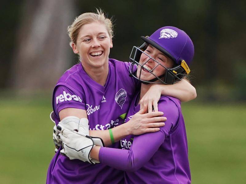 Emily Smith (R) has copped a three-month ban over the early release of a Hobart WBBL team line-up.