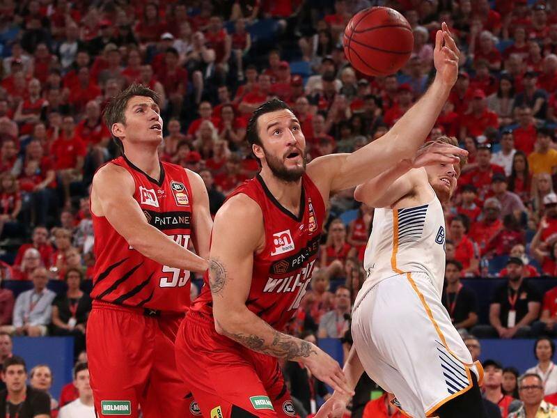 Perth's American import Miles Plumlee (C) will be key for the Wildcats in the NBL playoffs.