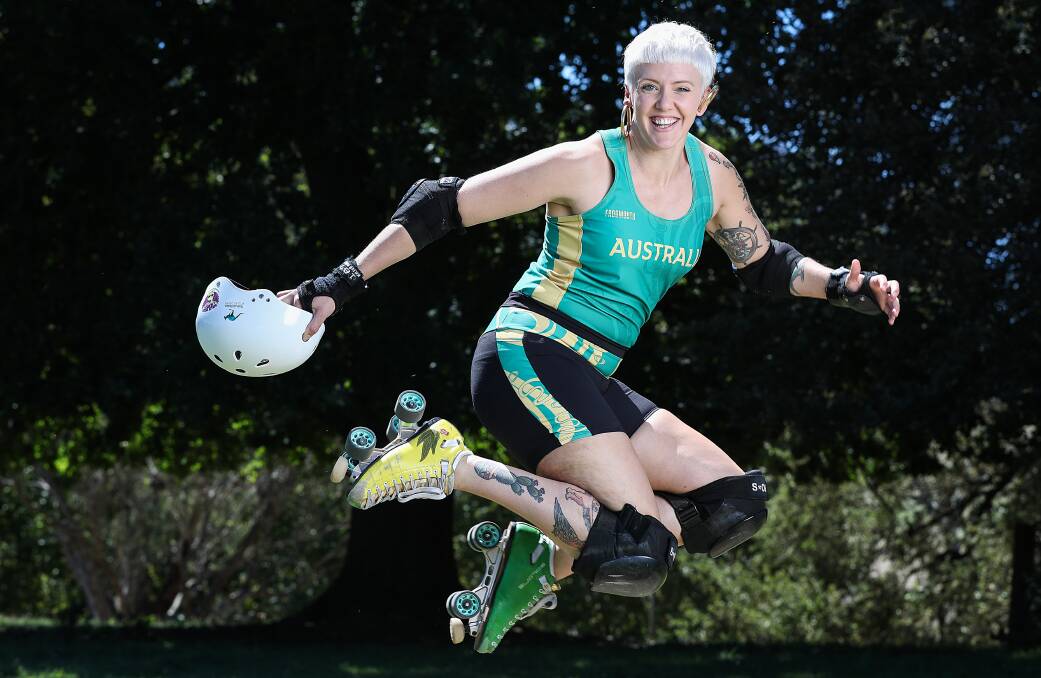 Tui Lyon from Tallangatta jumping for joy after taking home silver at the World Roller Derby Championships in Manchester. Picture: Mark Jesser