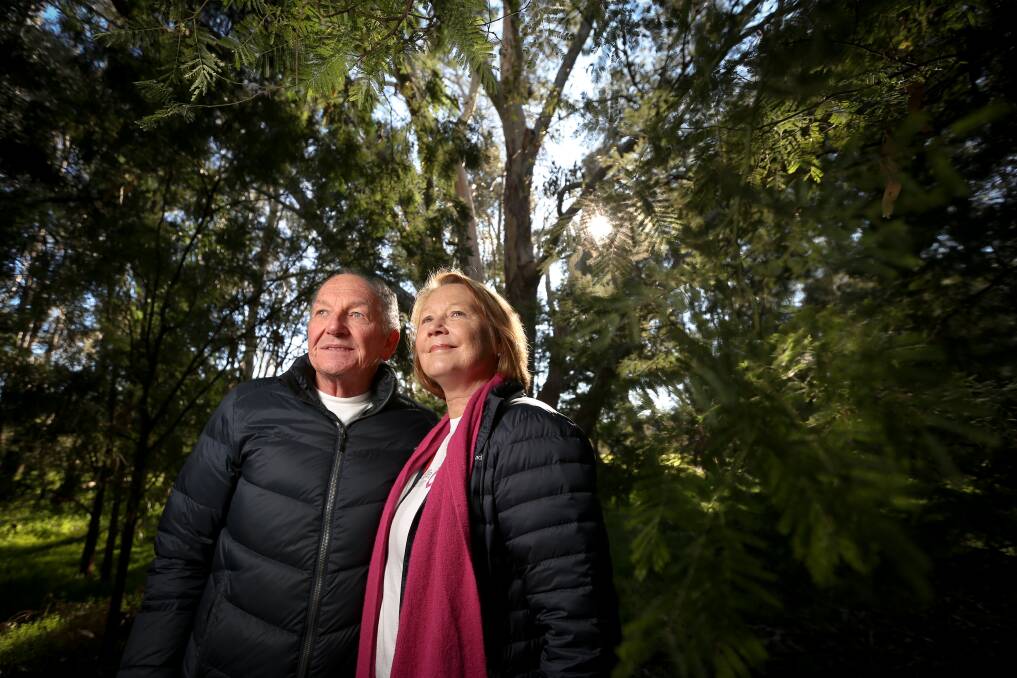 BLISSFULLY HEALTHY: Sue and Brian Elliott on the Murray River during a walk. Picture: JAMES WILTSHIRE