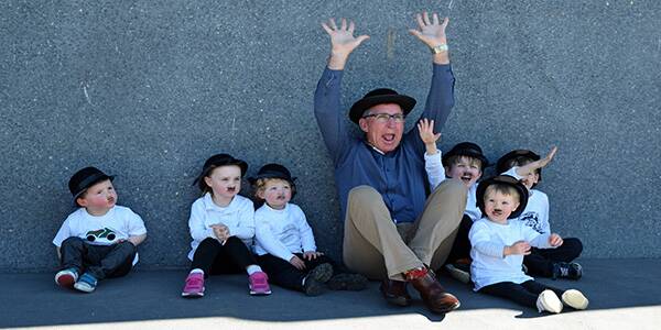 HATS OFF: Mayor Kevin Mack and some young residents as Charlie.