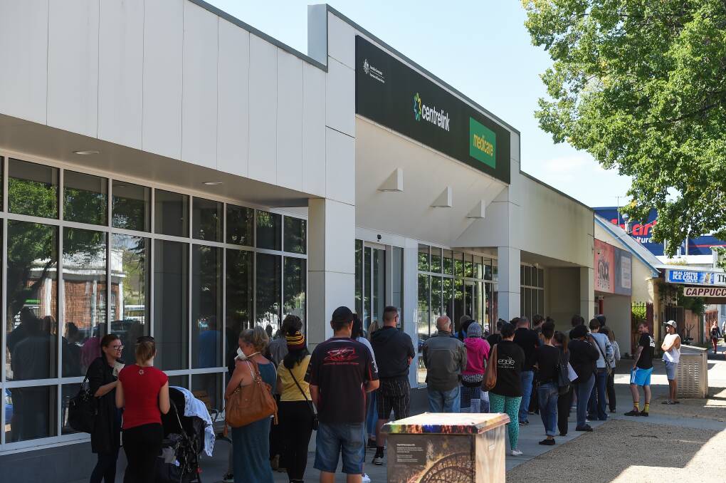 SUPPORT: Queues form outside Albury Centrelink in March 2020.