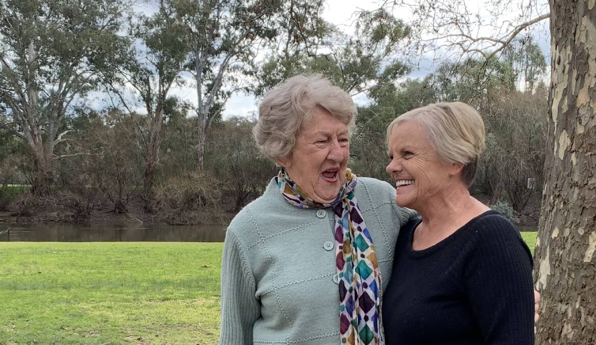CLOSE: Corowa's Carmel Packer with Barbra Cater who grew up at Bonegilla Migrant Camp and St John's Orphanage in Thurgoona.