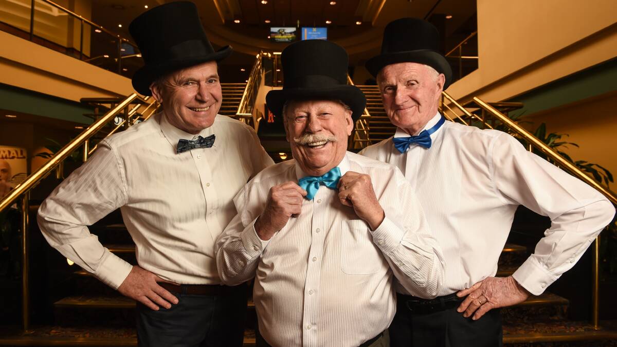 Glenn Rose, Errol Smith and Don Bensley prepare for the Albury Wodonga Prostate Cancer Support Group's Blue Tie Ball in 2016. 