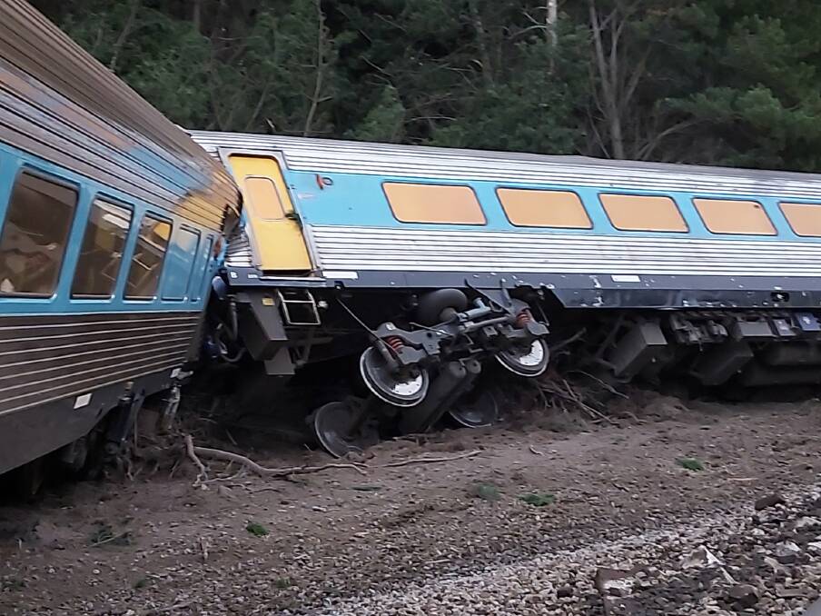 EXAMINE: Sixty-six passengers and staff were injured when the train derailed near Wallan. The driver and accompanying qualified worker were killed. Picture: SCOTT RICKARD 