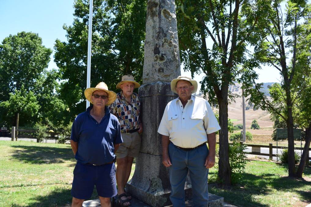PAST: Stuart Morant, Con Gigliotti and John Ried with the memorial before it was moved from its 