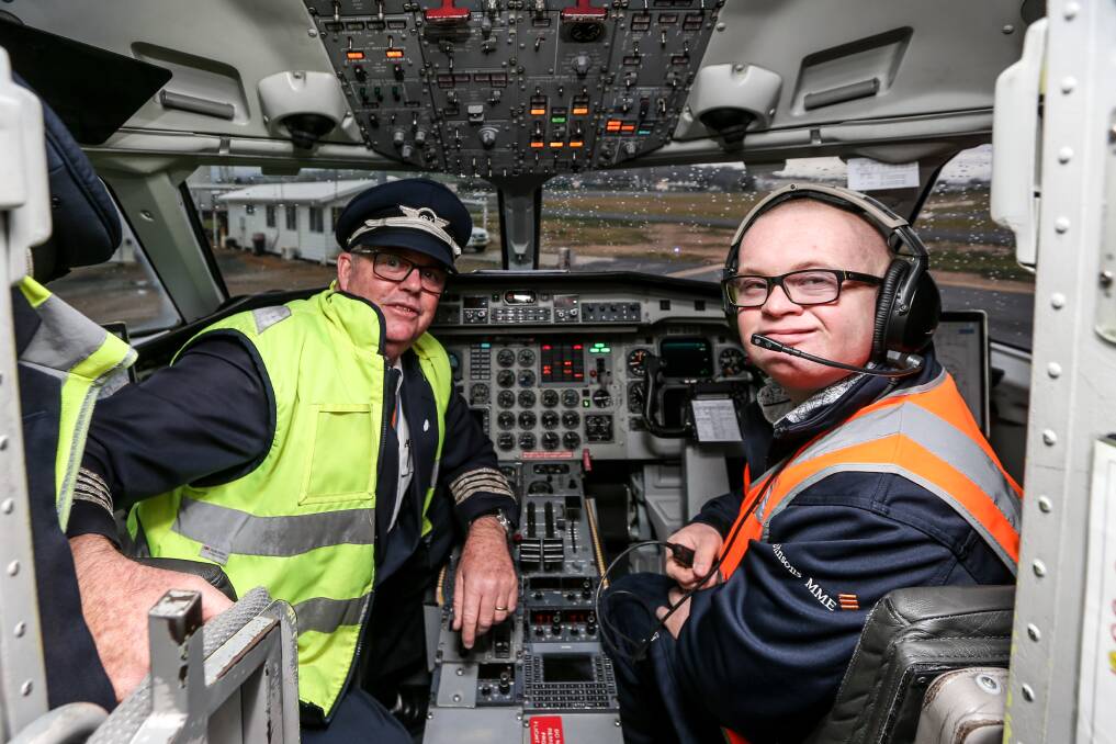 FLY WITH ME: James Plummer and REX pilot Tony Bugden at Albury airport. Picture: JAMES WILTSHIRE