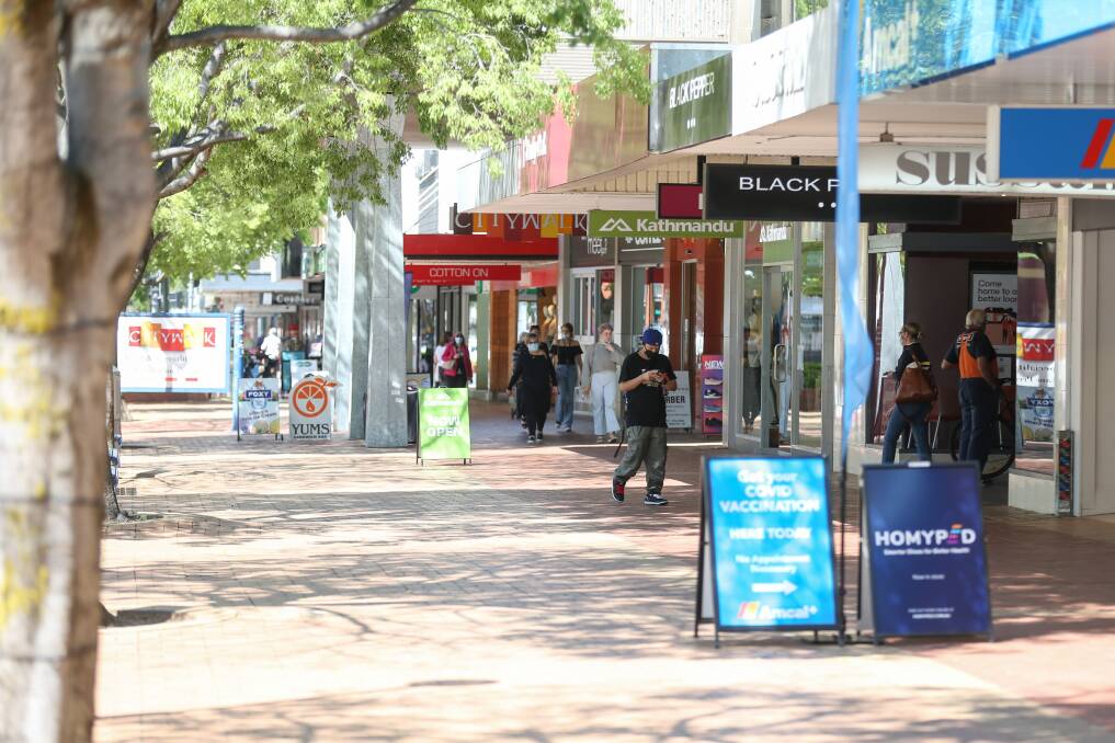 FREE: Shoppers on Dean Street, Albury, during 'Freedom Day' as NSW restrictions change under stage one of its roadmap to reopening. Picture: TARA TREWHELLA 