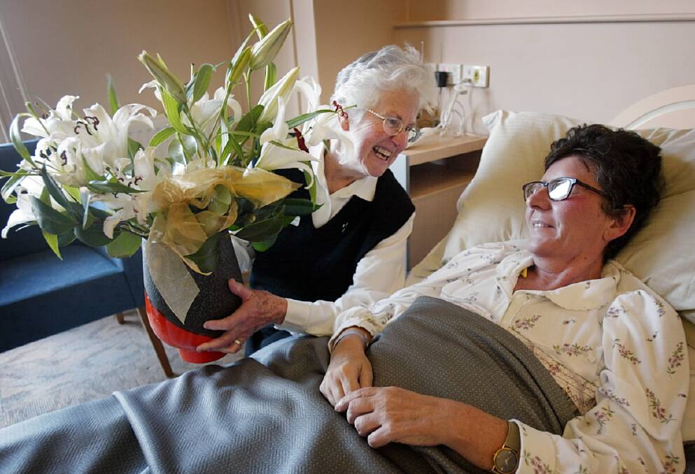 Sister Kate McCarthy with palliative care patient Robina Steiner in 2005 at the Mercy Hospital.