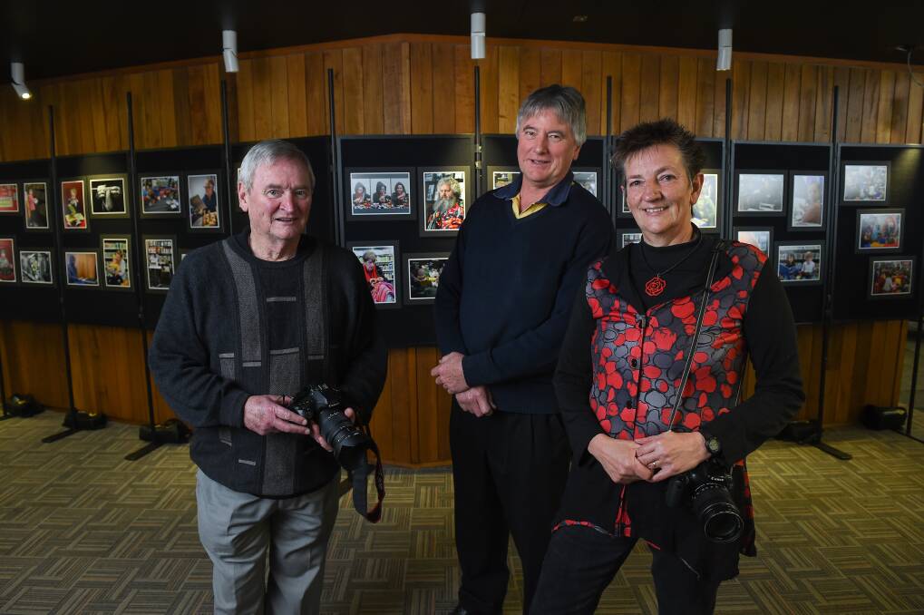 LIFE THROUGH A LENS: Benalla Camera Club's Ken Jenkins, Noel Baumgarten and Jen Fawkes whose photographs appear alongside other members at an exhibition at Benalla Library. Picture: MARK JESSER