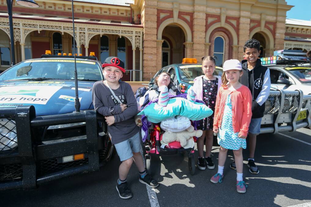 Seth Gordon, 10, Tilly, 13, Charlotte Holmes, 7, Hayley Gordon, 8 and Mallo, 10, all heading to Country Hope camp.
