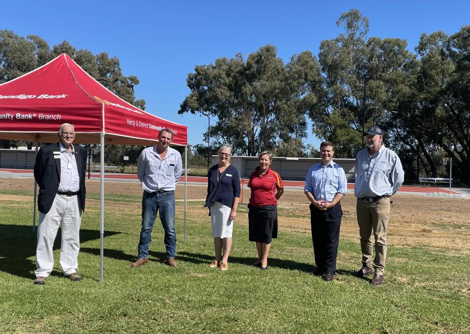 NEW: Riverina Water and Greater Hume's Doug Meyer, Bendigo Bank's Leigh Eulenstein, councillor Annette Schilg, Bendigo Bank's Gaynor McLeish, Member for Albury Justin Clancy and Henty Sports Ground chair Adrian O'Brien. 