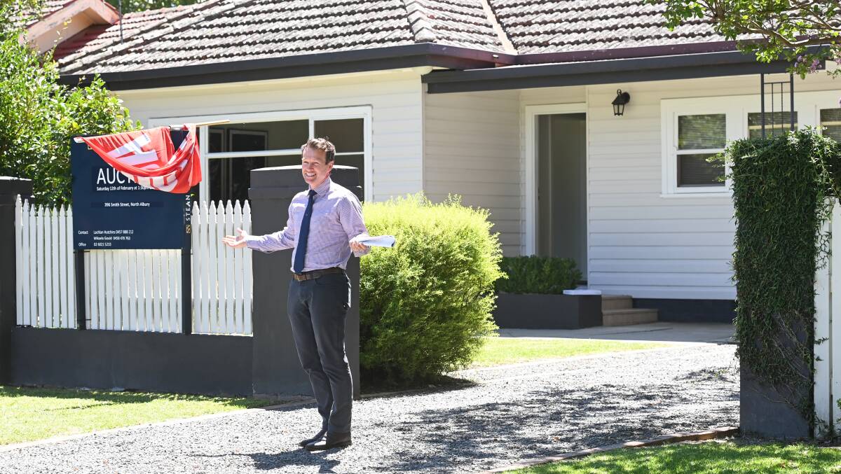 SELLING: Stean Nicholls auctioneer Lachlan Hutchins at 396 Smith St, North Albury. Picture: MARK JESSER