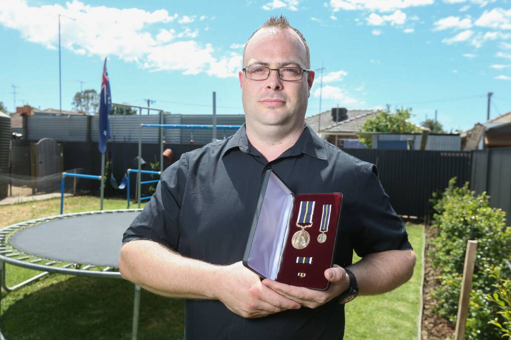 RELUCTANT: Luke Chilcott with his Victorian bravery award in November 2020. The Wangaratta man was among 43 Australians to receive a bravery medal this week from Australia's Governor-General. 