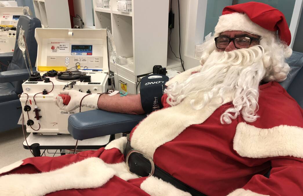 BLEED RED: Even Santa is rolling up his sleeve this festive season.