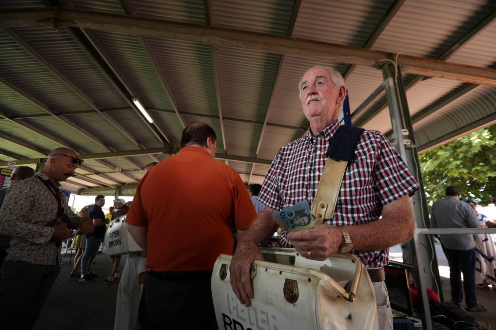 REAL WINNER: Bookie Peter Brown has been working at Wodonga racecourse for more than 40 years, which he says, shows he's doing something right. Picture: JAMES WILTSHIRE