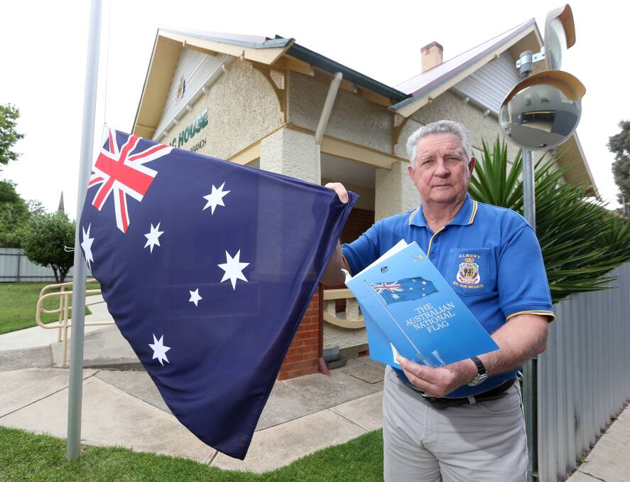 HONOUR: City of Albury RSL president Graham Docksey is calling on businesses to be aware of regulation around flying flags and ensure they are properly maintained and respected. Picture: KYLIE ESLER 