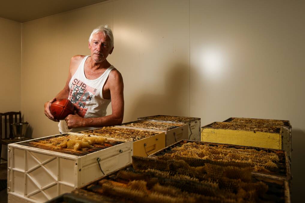 STING IN HIS TAIL: Neale McMonigle spends some of his spare time working as a bee keeper at Wangaratta. Picture: JAMES WILTSHIRE