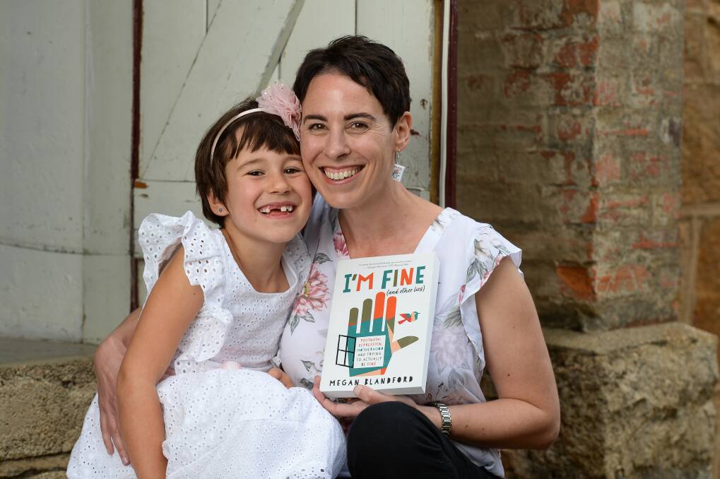 LOVE: Beechworth's Megan Blandford and her daughter Iris Cagalj, 6. Ms Blandford has published a book about her experiences with postnatal depression. Picture: MARK JESSER
