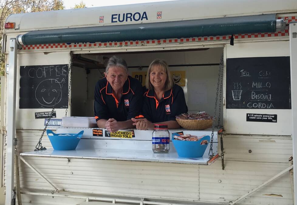GRAB A CUPPA: Jeff and Christine Nixon of VIC SES Euroa unit at Driver Reviver site last year. The SES is calling on people to take regular breaks when driving.