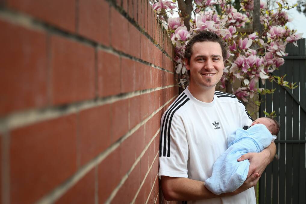 NEW DAD: Albury's Jayden Williams celebrated his first Father's Day on Sunday with his two-week-old son Jaxon. Picture: JAMES WILTSHIRE