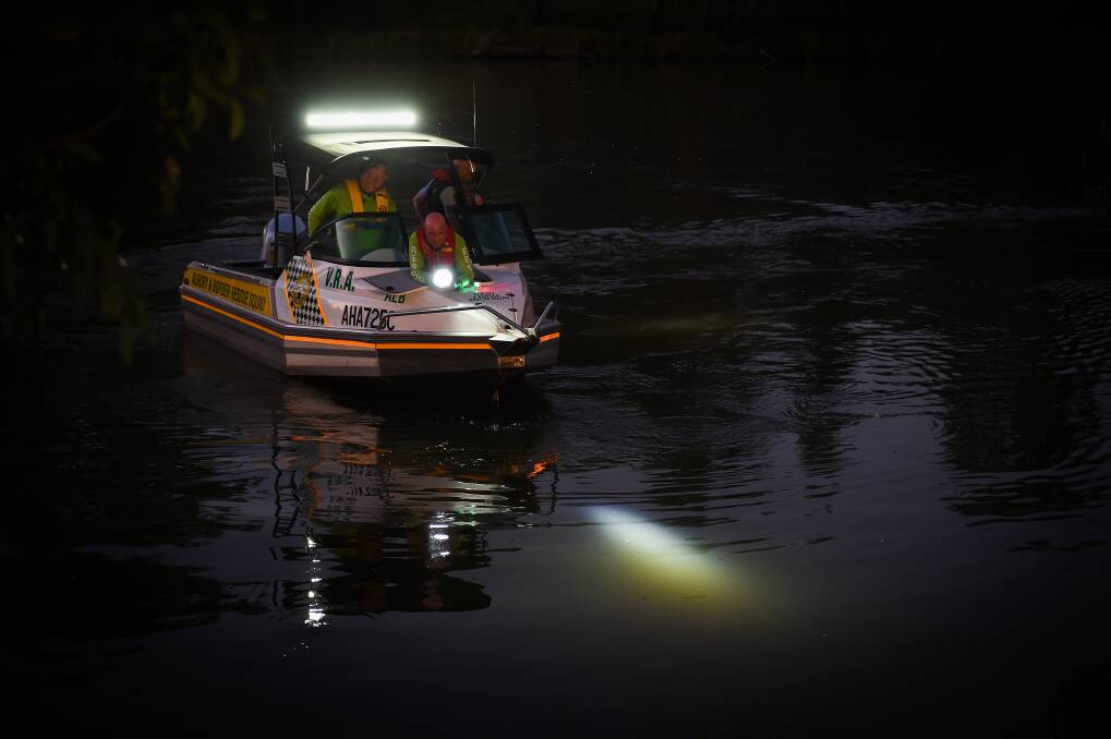 SEARCHING: Rescuers scoured the Murray River the night Bigul Pandit went missing. More than a month on they're still hopeful they will be able to reunite him with his family. Picture: MARK JESSER