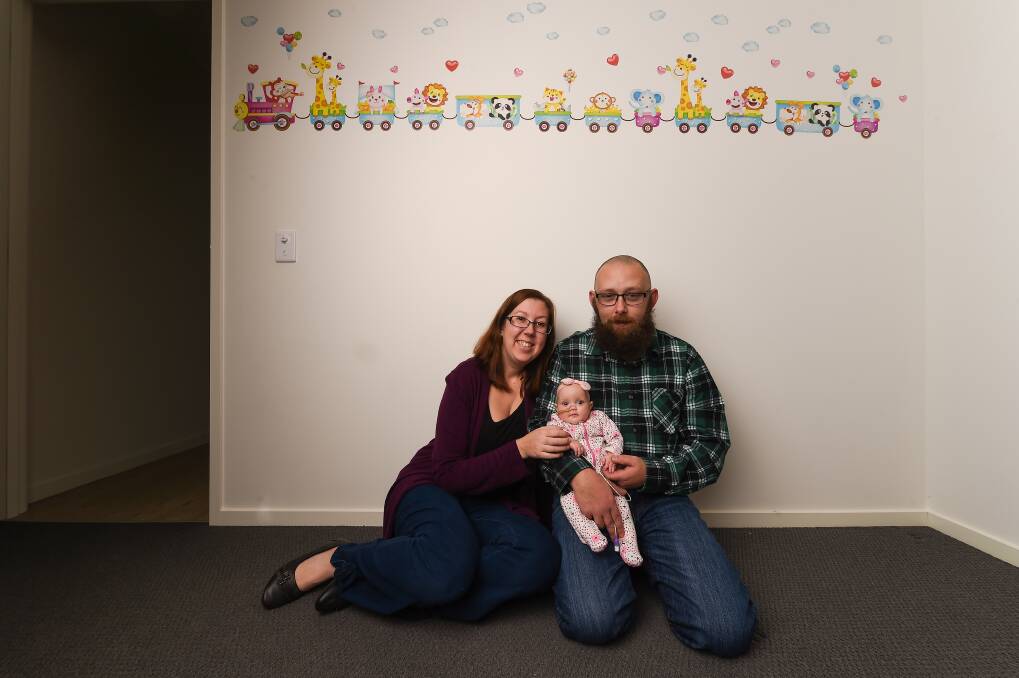 PROUD: Amanda Hulm and Mick Noonan with their beautiful baby girl Charlotte Noonan, five months. Picture: MARK JESSER 
