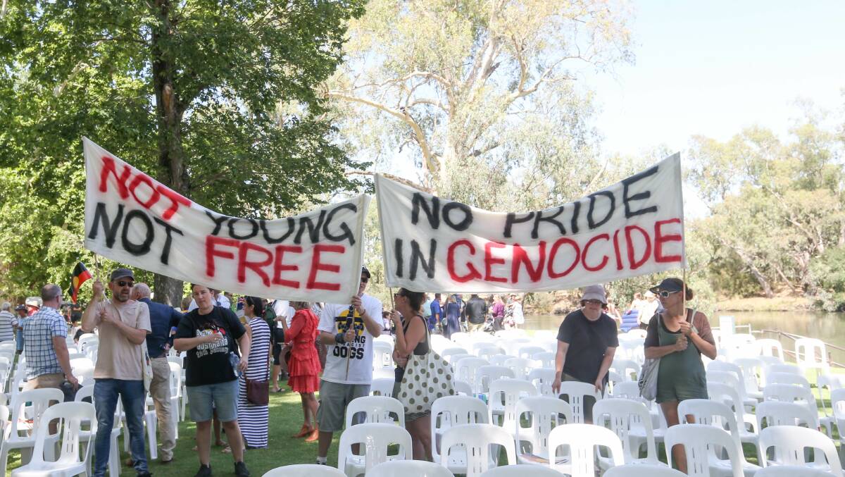 UPSET: Protesters at Albury's Australia Day ceremony say the event celebrates genocide. Picture: TARA TREWHELLA 