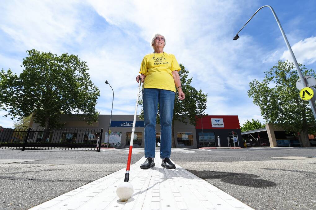 BE AWARE: Rowena Ginns has used a white cane for four years to travel independently and said phone use is a danger. Picture: MARK JESSER