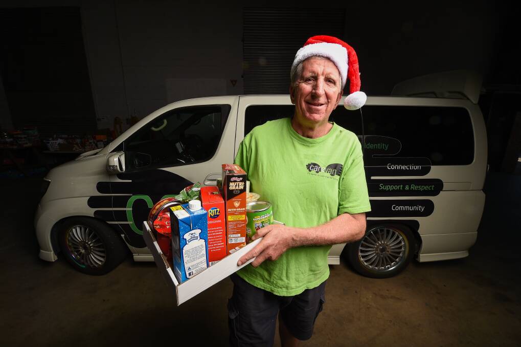 GIVING HOPE: Carevan director Dave Gleeson says about 200 Christmas hampers will be given to those in need this year. Picture: MARK JESSER